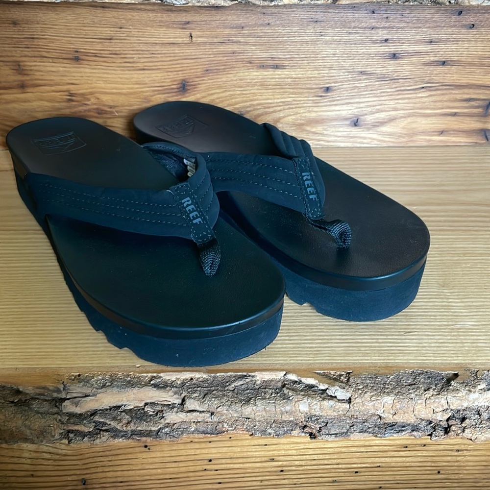 Reef platform black sandals